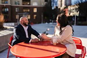 a-man-and-a-woman-sitting-at-a-table